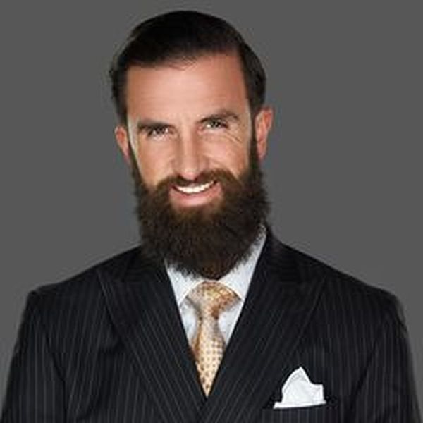 Professional headshot of Tim Sweetman, broker of Sweetman Real Estate.